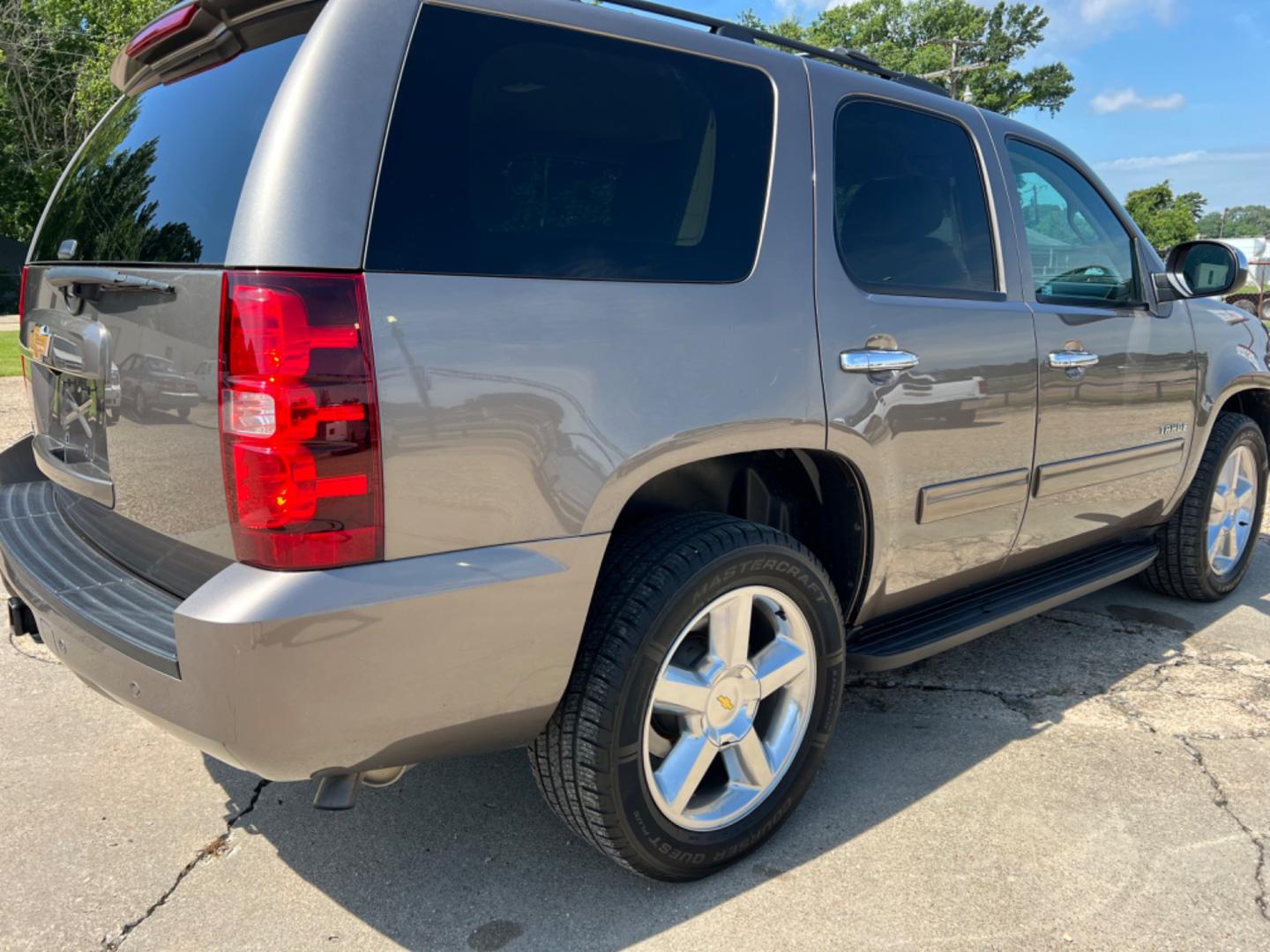 2014 Brown /Tan Chevrolet Tahoe LS (1GNSCAE04ER) with an 5.3L V8 engine, Automatic transmission, located at 4520 Airline Hwy, Baton Rouge, LA, 70805, (225) 357-1497, 30.509325, -91.145432 - 2014 Chevy Tahoe LS 5.3 V8 Gas, 147K Miles, 8 Passenger Seating, Backup Camera, Power Windows, Locks & Mirrors, Cold A/C, Tow Pkg. FOR INFO PLEASE CONTACT JEFF AT 225 357-1497 CHECK OUT OUR A+ RATING WITH THE BETTER BUSINESS BUREAU WE HAVE BEEN A FAMILY OWNED AND OPERATED BUSINESS AT THE SAME LOCA - Photo#5